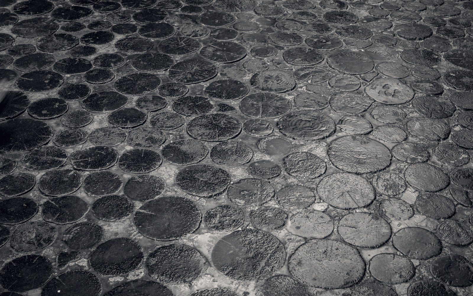 A paved circular threshing floor on an exposed spur